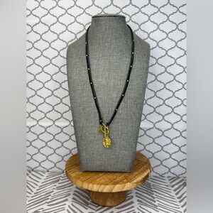 Elegant black leather necklace with gold bee pendant